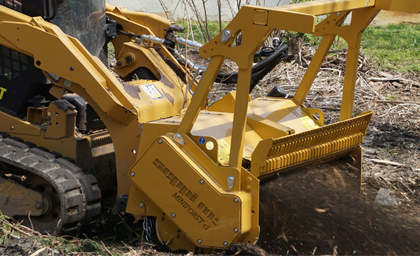 CTL mulcher clearing brush